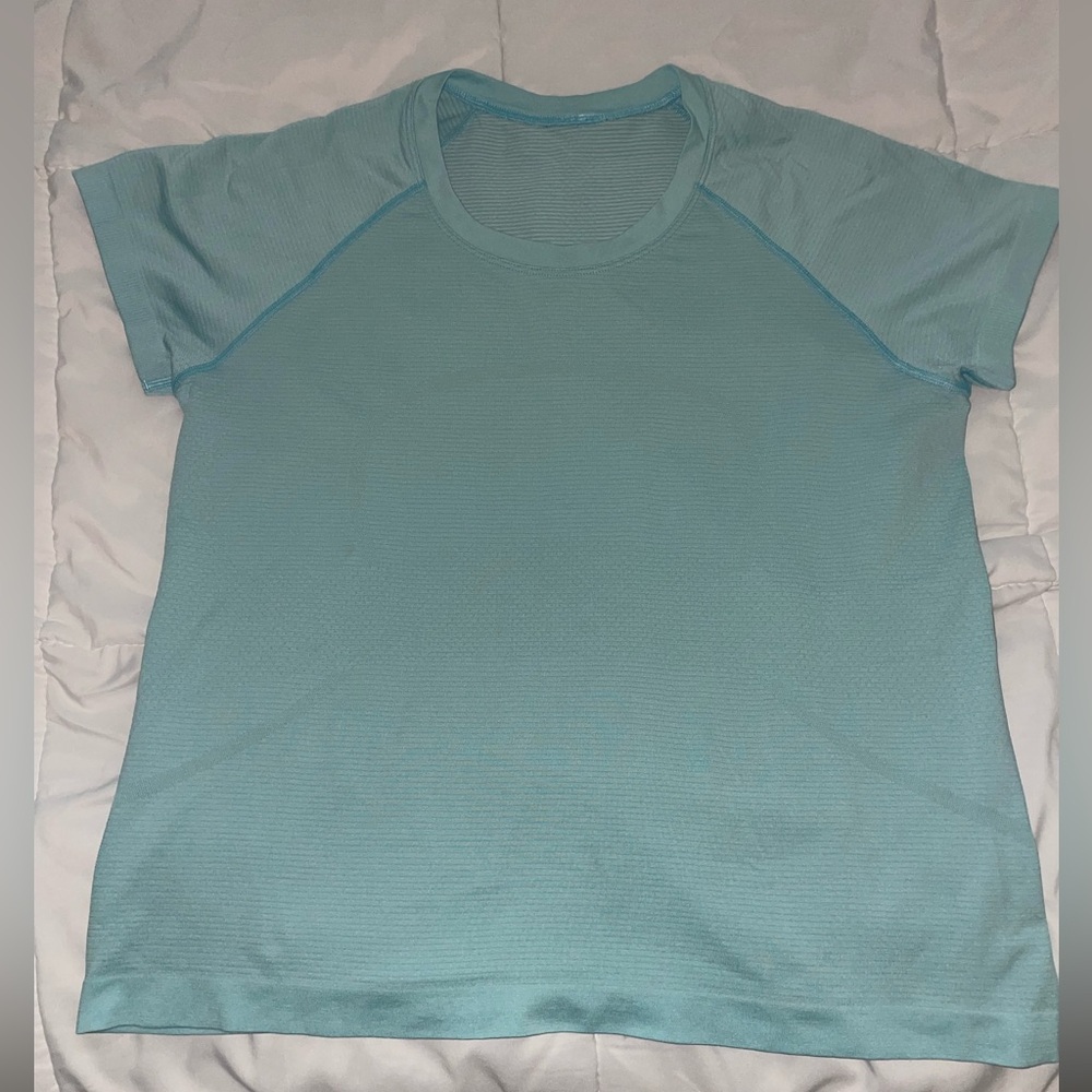 Swiftly tech lululemon race length, baby blue shirt, size 12